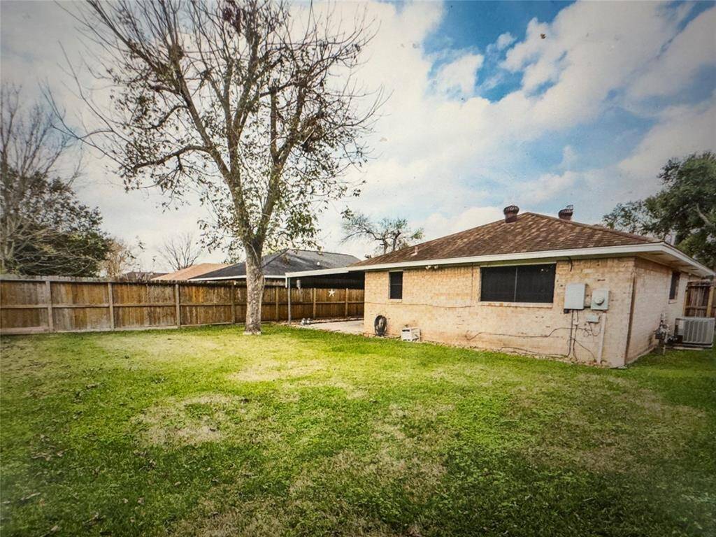 Large back yard with covered patio!