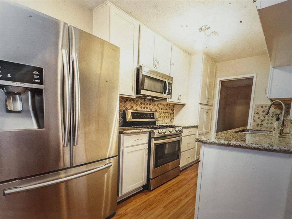 So many upgrades with granite counters and stainessappliances!