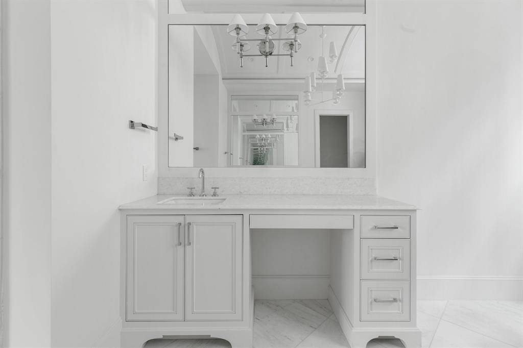 "Her" vanity also offers a built-in vanity space with in-drawer organization for blowdryers/iron/curler etc.