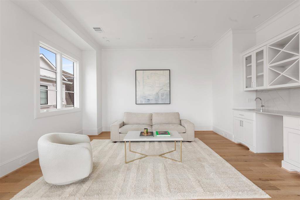 The spacious fourth-floor game room offers the perfect flexible layout—ideal for a media lounge, playroom, or entertaining hub.