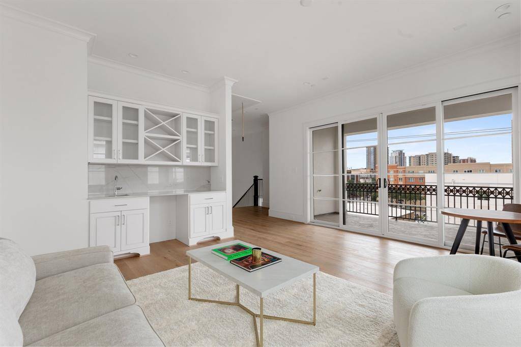 The built in concession center features drawers and cabinets, bottle storage, glass-front display, and an optional upgrade to include a beverage refrigerator.