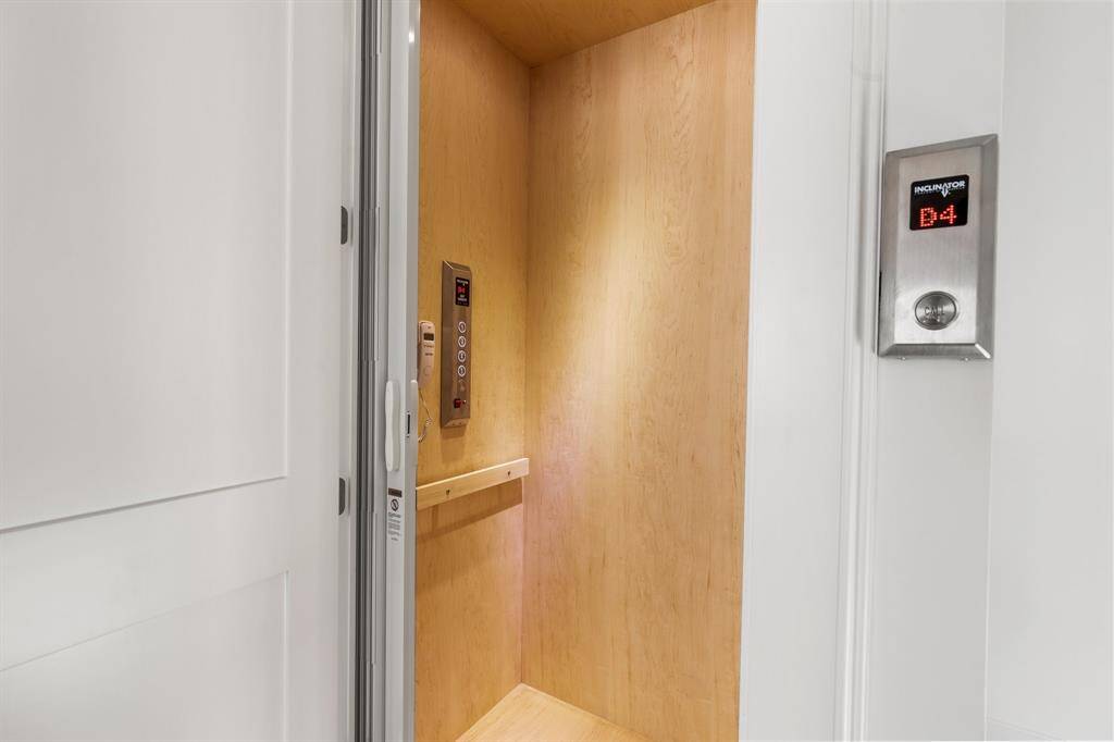 Experience effortless luxury with the built-in elevator, providing seamless access to all levels of the home. This thoughtful feature combines convenience and sophistication, ensuring every floor is just a touch away.