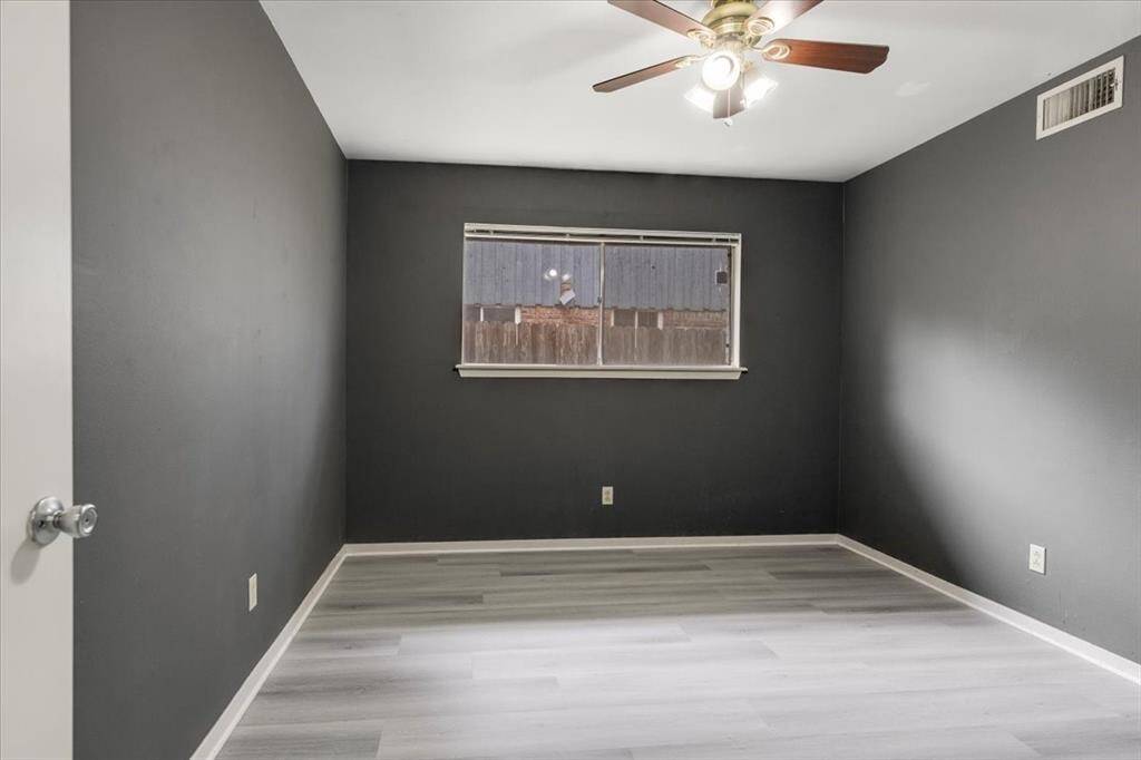 Bedroom 2 with new LVP flooring.