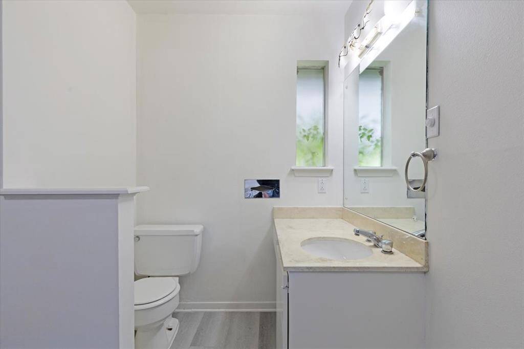 Bedroom 3 includes a half bathroom.