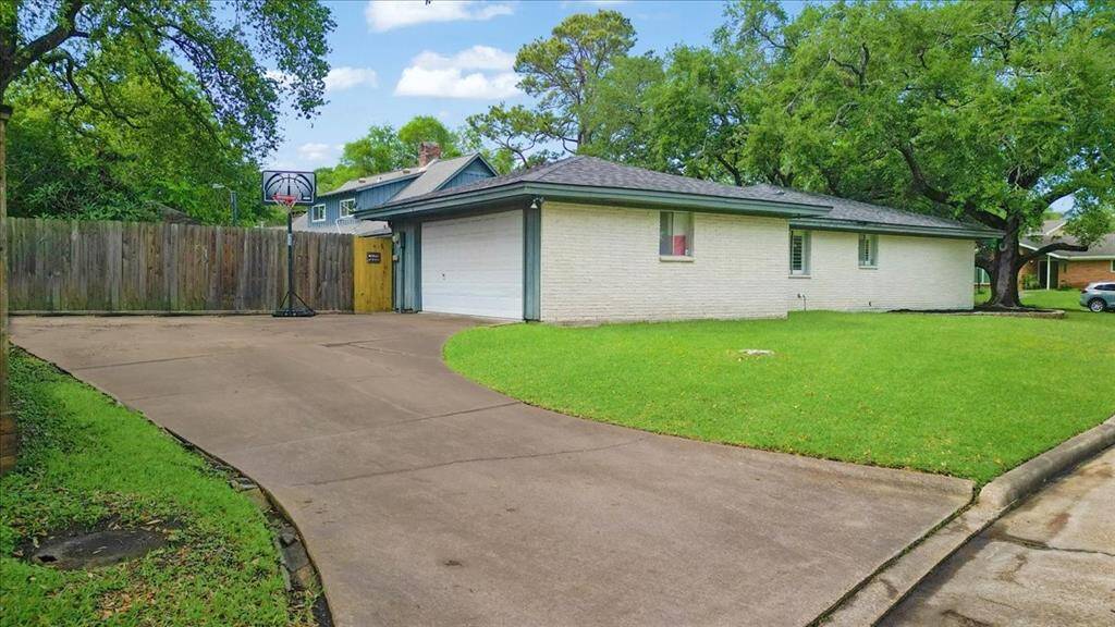 The garage is on the side of the home.