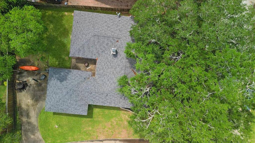 The roof was replaced in 2018. Look at all those trees!
