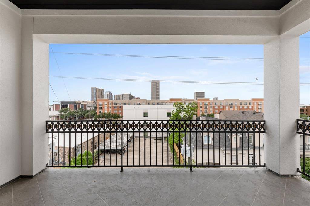 The expansive rooftop terrace is ready for entertaining with water/gas hookups and prewiring for TV and sound.