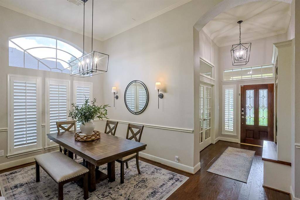 Beautiful dining area and did we mention custom plantation shutters!