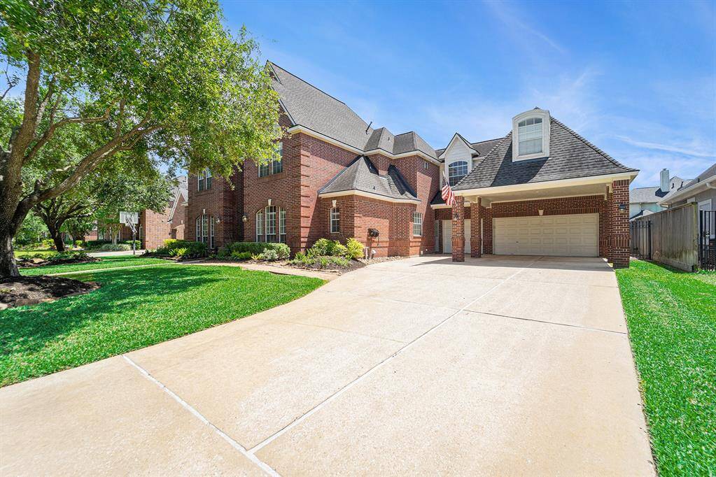 This spectacular home features 4 beds, 3 full baths, 2 half baths, a media room, a game room, and so much more!
