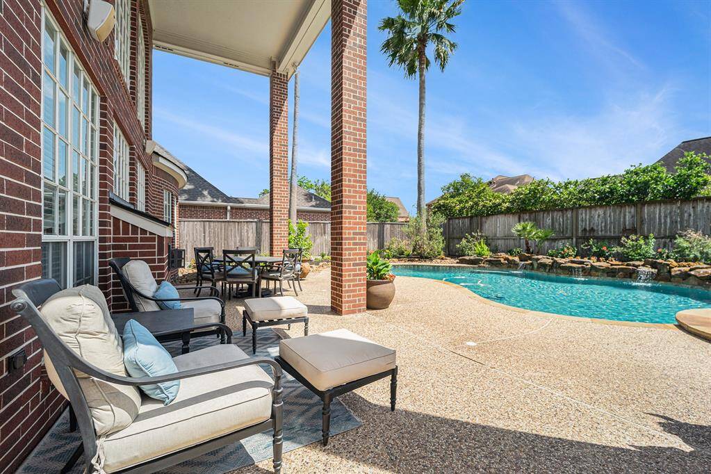 Step outside to the spectacular covered patio with lots of room for entertaining!