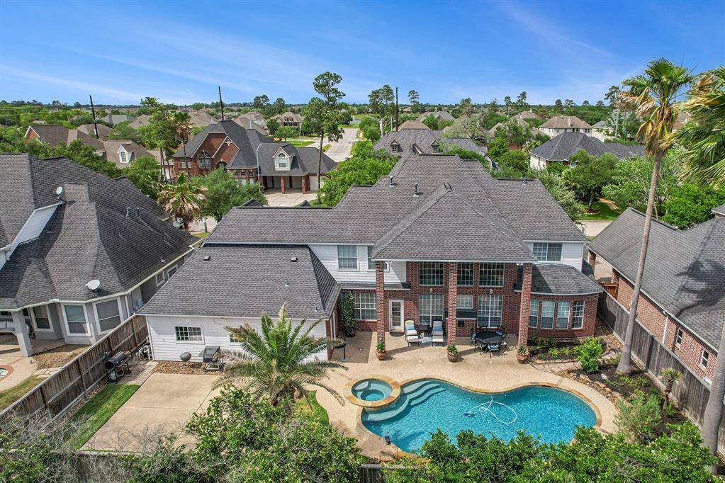 Birds eye view of this breathtaking backyard.