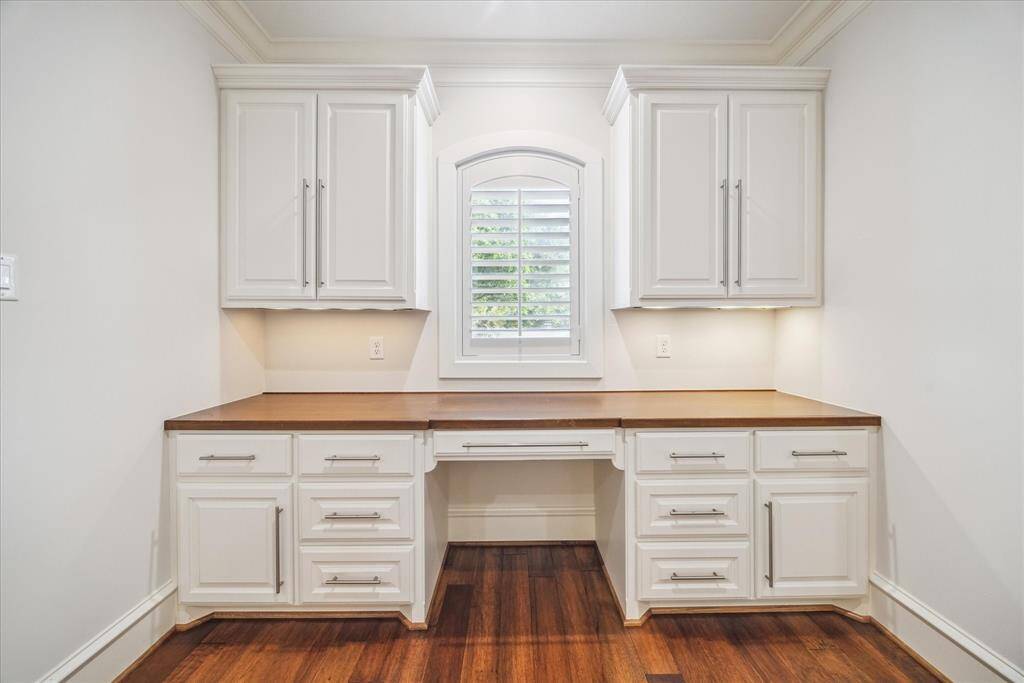 Convenient custom office area at the top of the stairs.