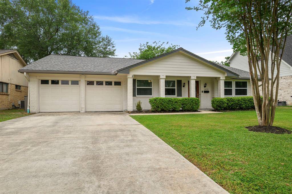 TWO CAR GARAGE WITH DOUBLE WIDE DRIVEWAY