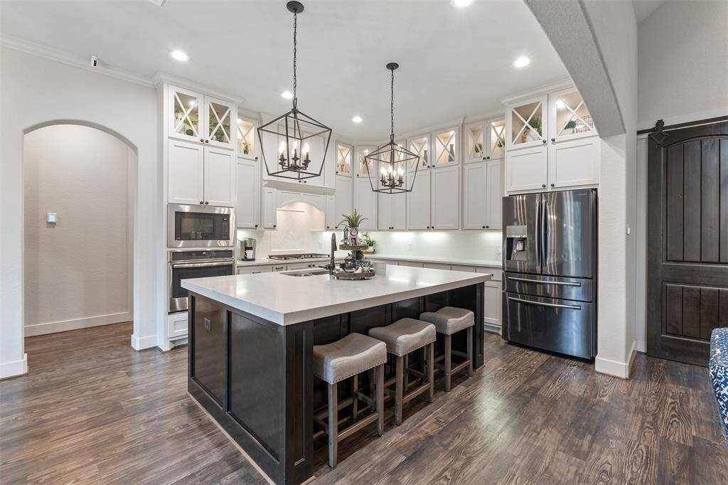 This massive kitchen island is great for easy dining and storage.
