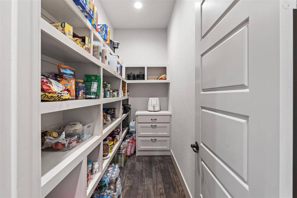 Walk-in pantry makes great additional storage.