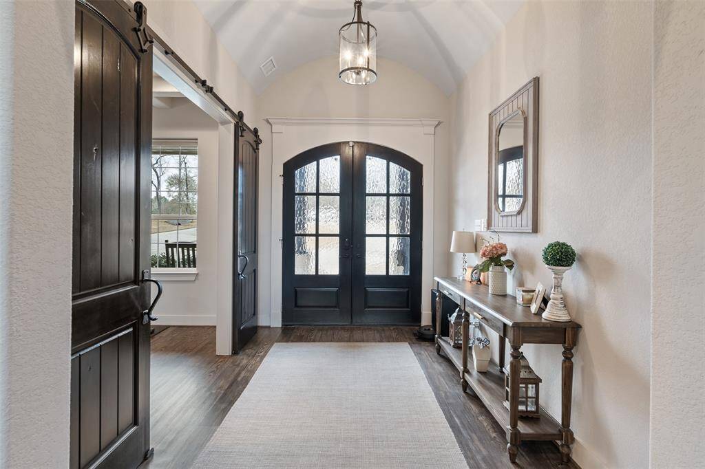 Back to the formal entry way with double doors and so much open space.