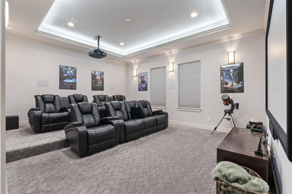 Down the hall from the secondary rooms is the media/theater room.