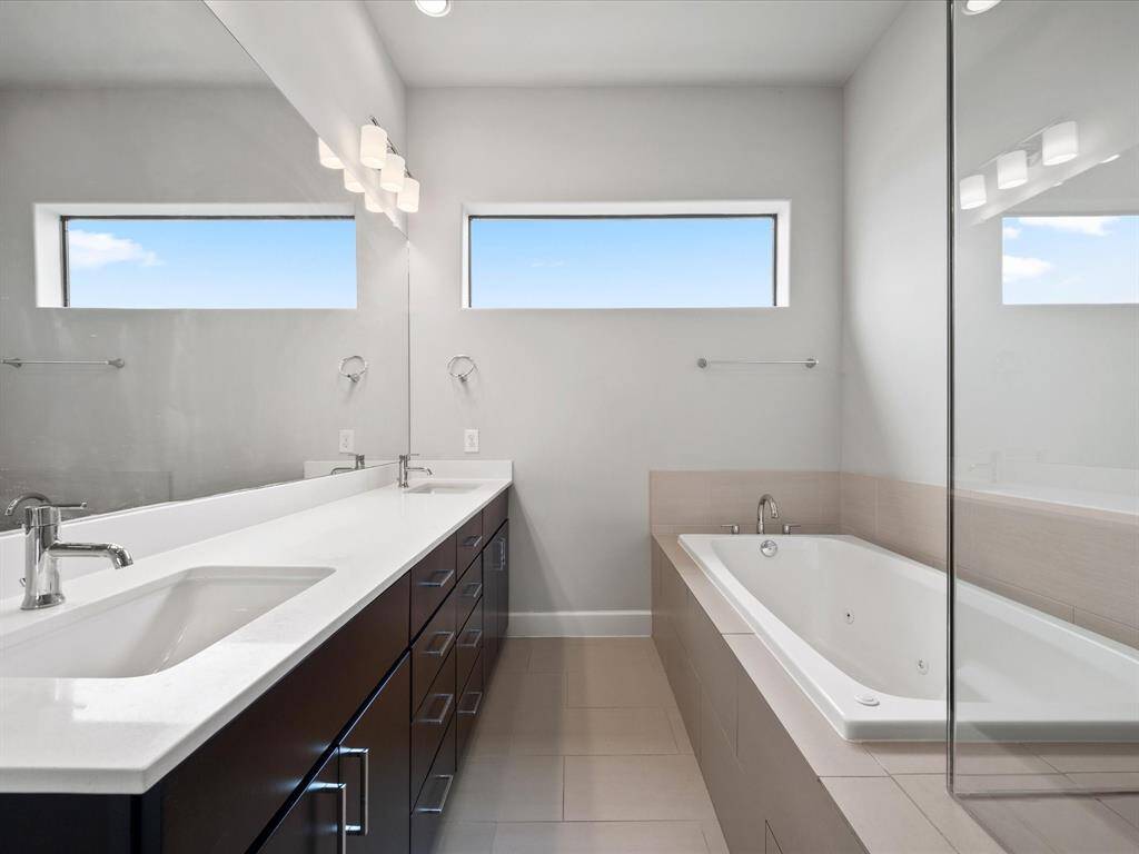 Two sinks for extra room space and with modern fixtures