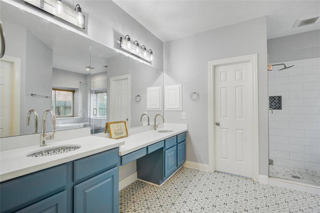 Why shouldn't your Primary bath be fun?!  Dual vanities with plenty of storage. There is so much space to get ready here.