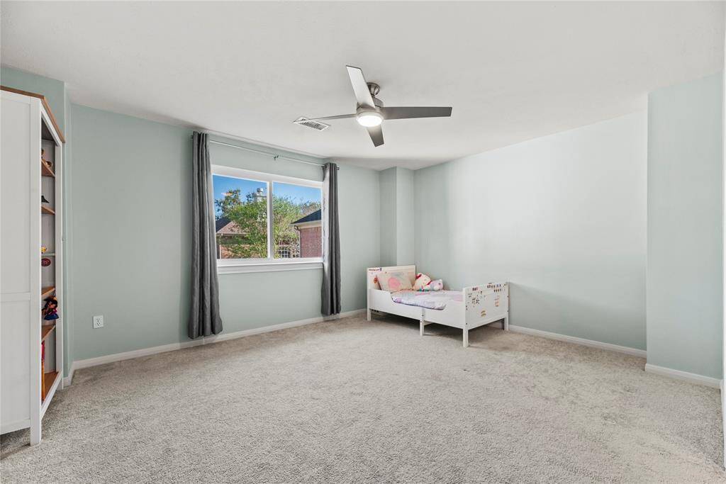 The 3rd bedroom with so much room.  These secondary bedrooms are great size.