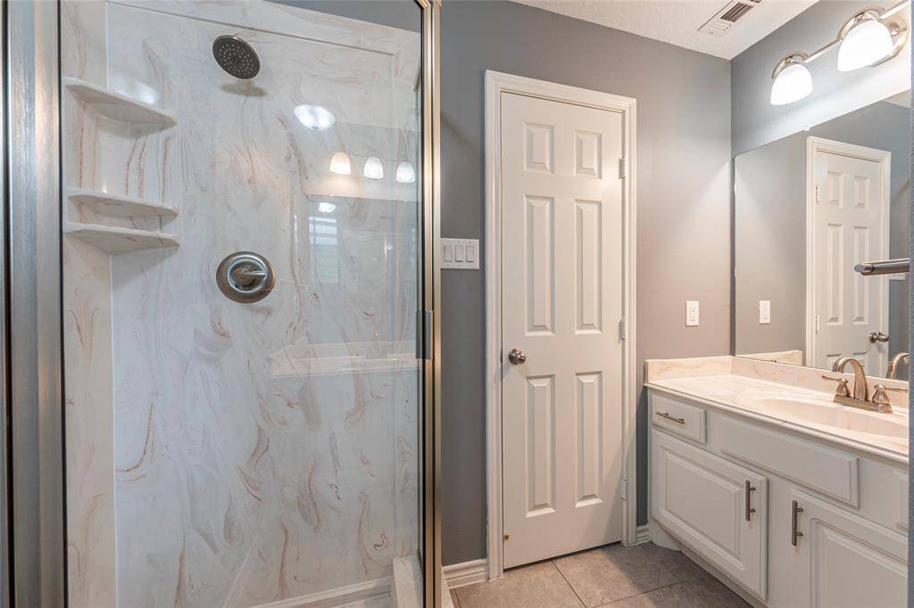 second primary bath down near the garage