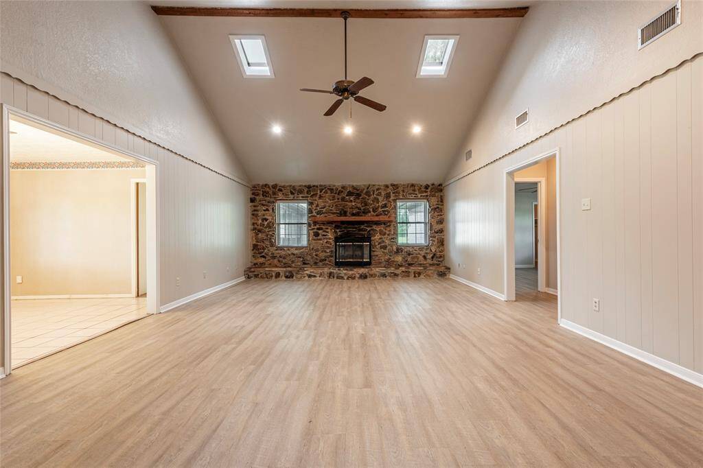 Stone fireplace shares the charm of the original home