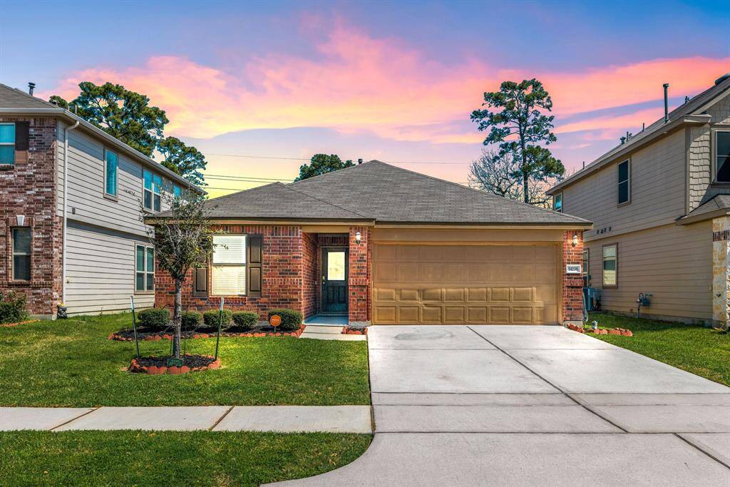 Welcome home to 14238 Persimmon Woods located on a quiet street in Cypress Creek Crossing and zoned to Spring ISD! This stunning home has lovely curb appeal, a well-manicured lawn, beautiful landscaping, brick elevation, dark stained front door with glass detailing, covered front porch, traditional style, dark stained shutters, beautiful outdoor lanterns and a double wide driveway!