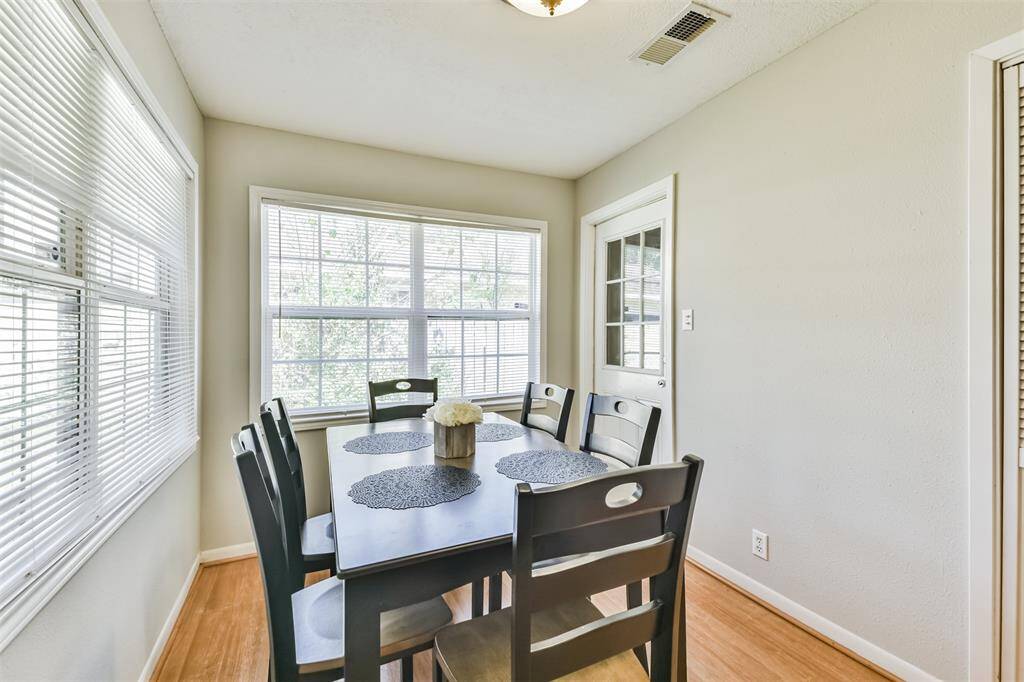Breakfast area with pantry and garage entry doors close by