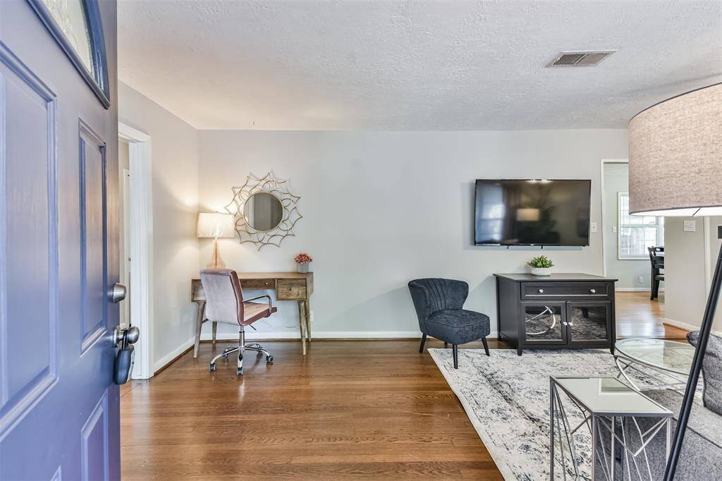 The door opens to Open concept living.