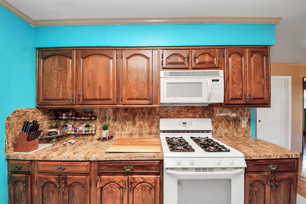 Beautiful wood cabinetry and plenty of counter space