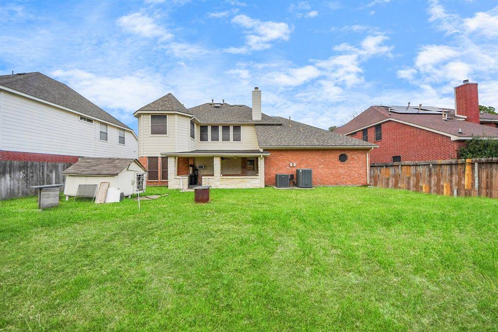 Reasonably sized backyard with a nice covered patio.
