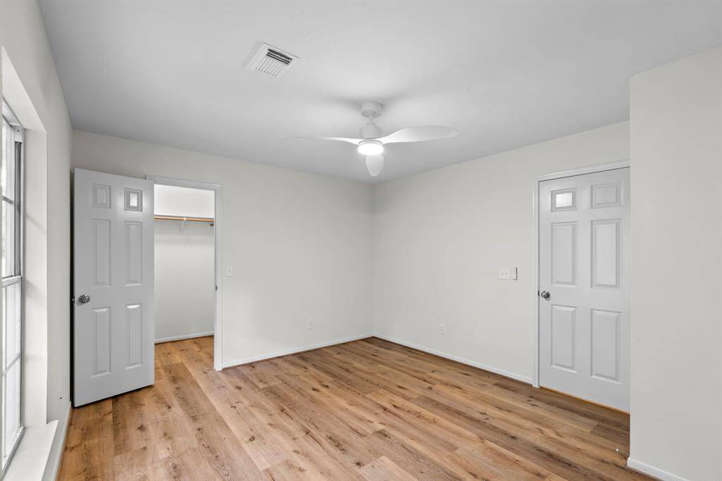 A view of Bedroom #2 walk-on closet.