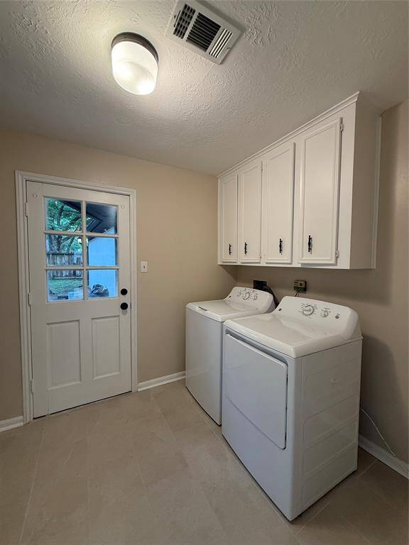 The laundry room. It includes the washer and dryer.