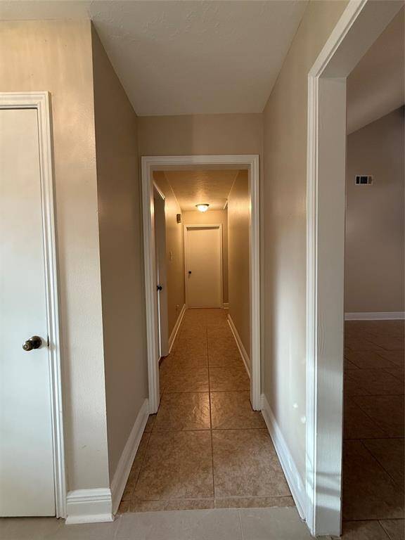 The hallway to the rooms.