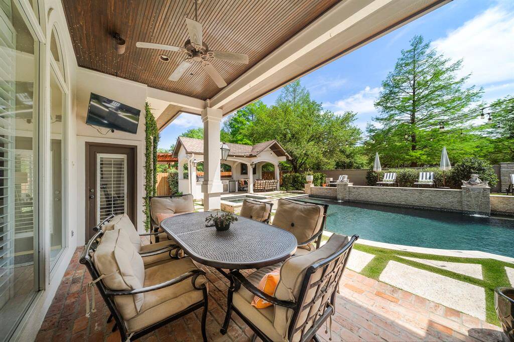 All details of this home were carefully thought out! This backyard is an entertainer's dream!