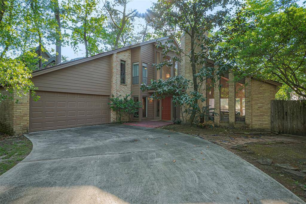 Magnificent Mid-Century two-story masterpiece nestled in the sought-after enclave of the Village of Grogan’s Mill. Bathed in abundant natural light, its open-concept design is ideal for today’s lifestyle, seamlessly unifying the grand living room, formal dining space, and gourmet kitchen for effortless entertaining.