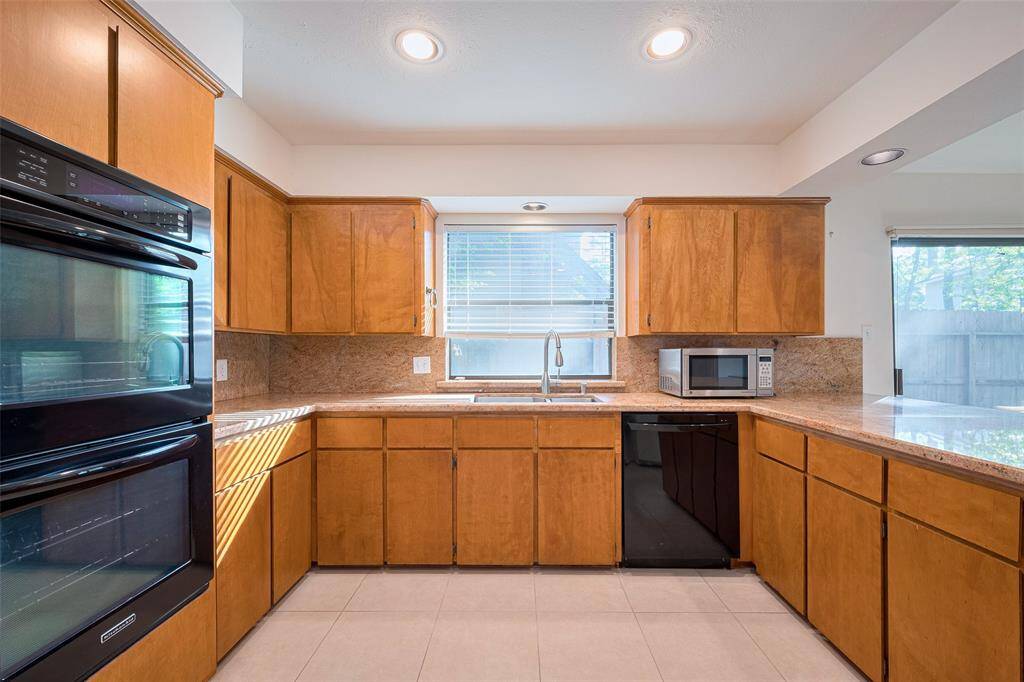Kitchen is filled with abundant natural light, creating a warm and welcoming space that’s perfect for cooking, gathering, and making memories.