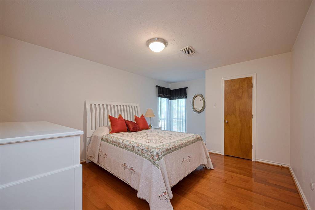 Secondary bedroom with walk-in closet