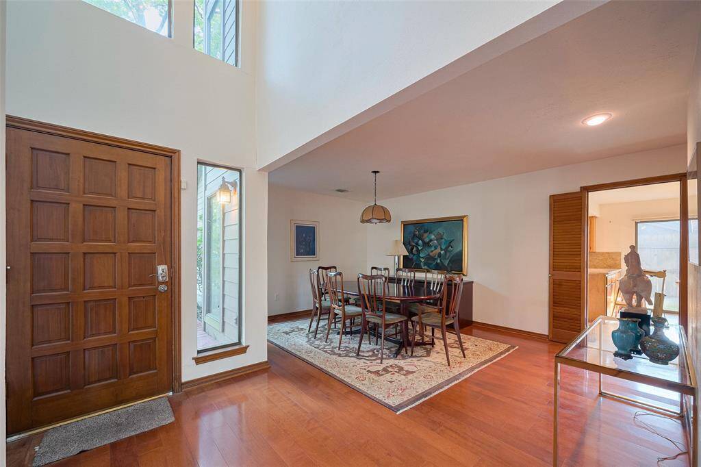Welcome to 16 Crinkleroot! Step into the inviting foyer that gracefully unveils the home's thoughtfully designed open floor plan, offering a warm, welcoming atmosphere and a seamless flow throughout the living spaces.