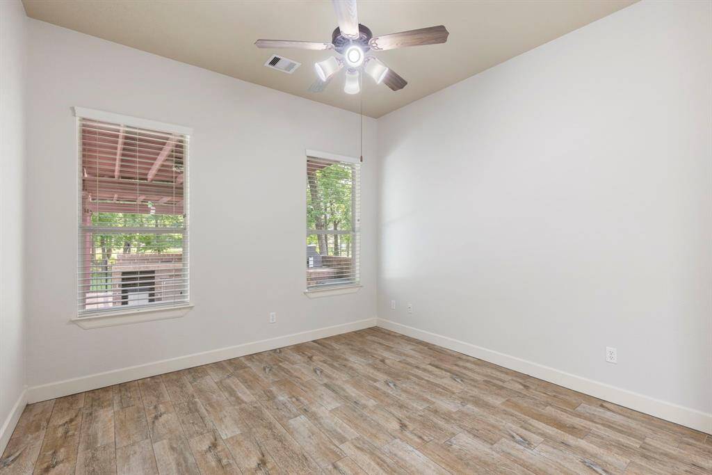 Secondary bedrooms are connected by a Jack-and-Jill bath.