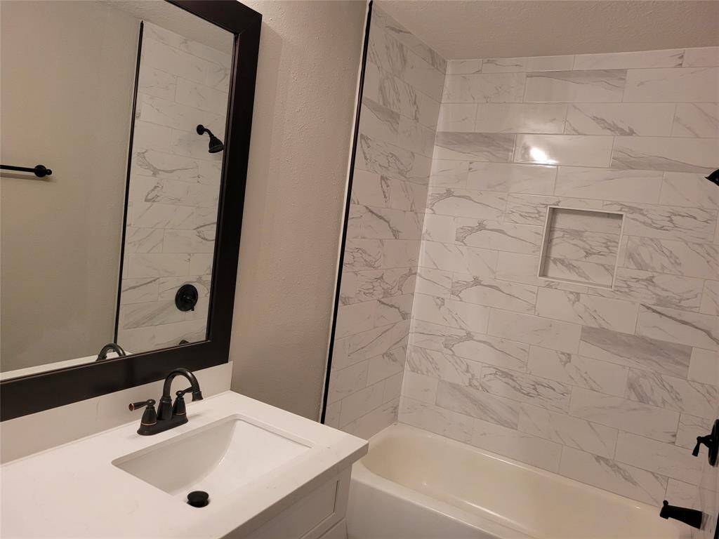 Remodeled primary bedroom bathroom.