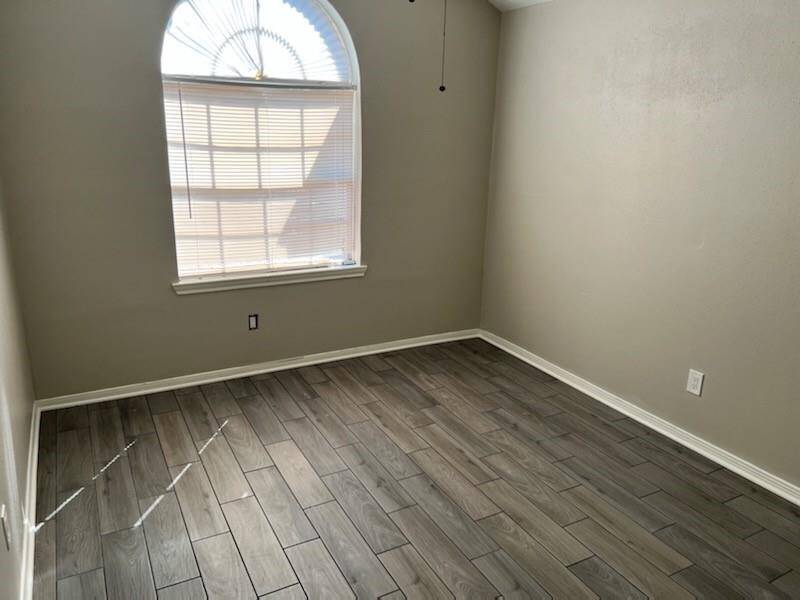 Second bedroom with great light and high ceilings.