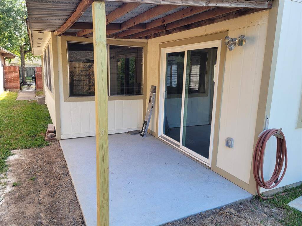 11 ft x 9 ft covered patio with afternoon shade.