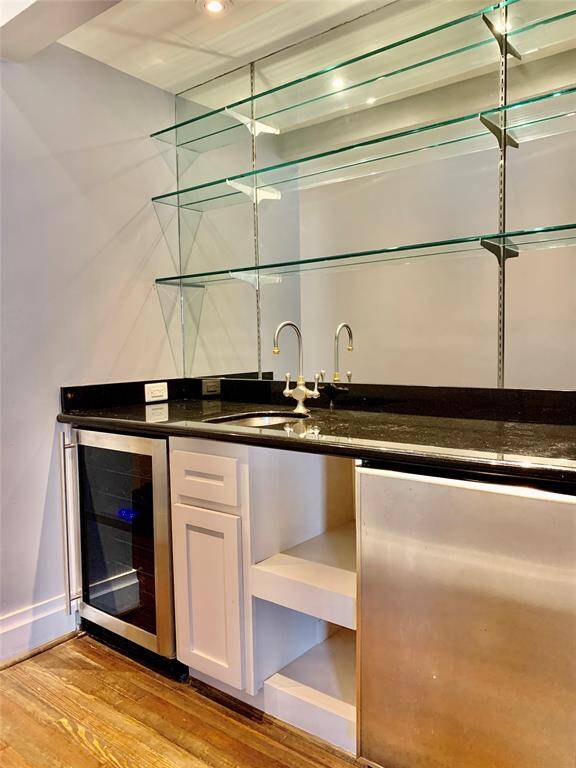 Beautiful wet bar equipped with beverage cooler