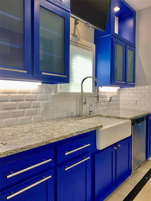 Gourmet kitchen with striking cabinets