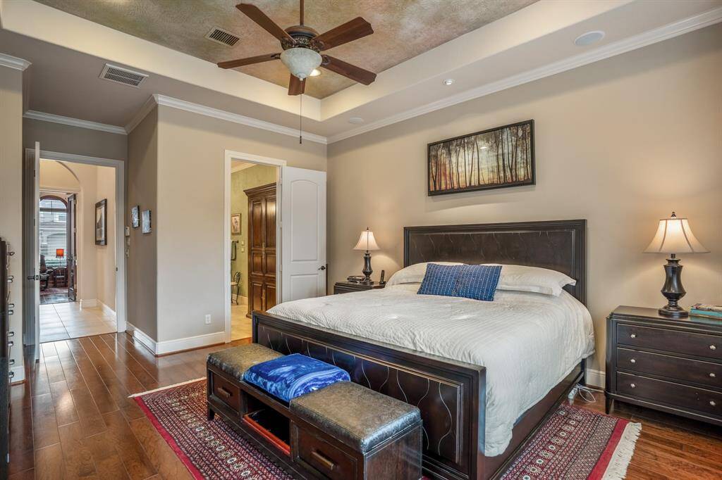 This harmonious blend of the bedroom's inviting ambiance and the bathroom's essential amenities ensure a serene and functional sanctuary for the owner.