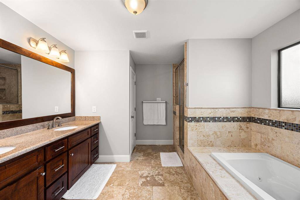 Primary Bathroom with separate shower and double sinks