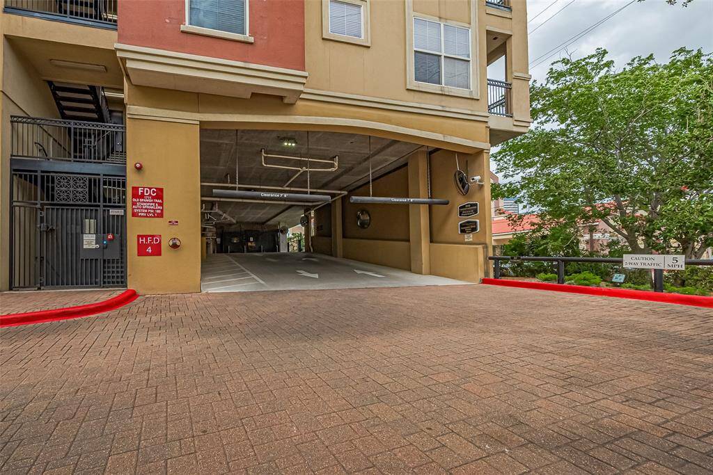 Secure and well-maintained, the covered parking entrance ensures easy access with direct elevator service to each floor.