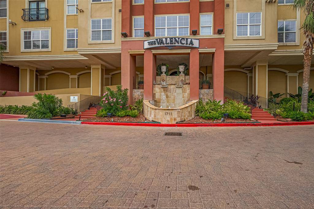 Classic and refined, the building’s exterior blends stately architecture with thoughtful landscaping, creating a polished first impression.