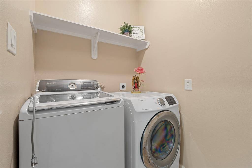 Laundry with full walk in closet downstairs